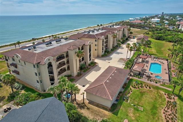 aerial view with a beach view and a water view