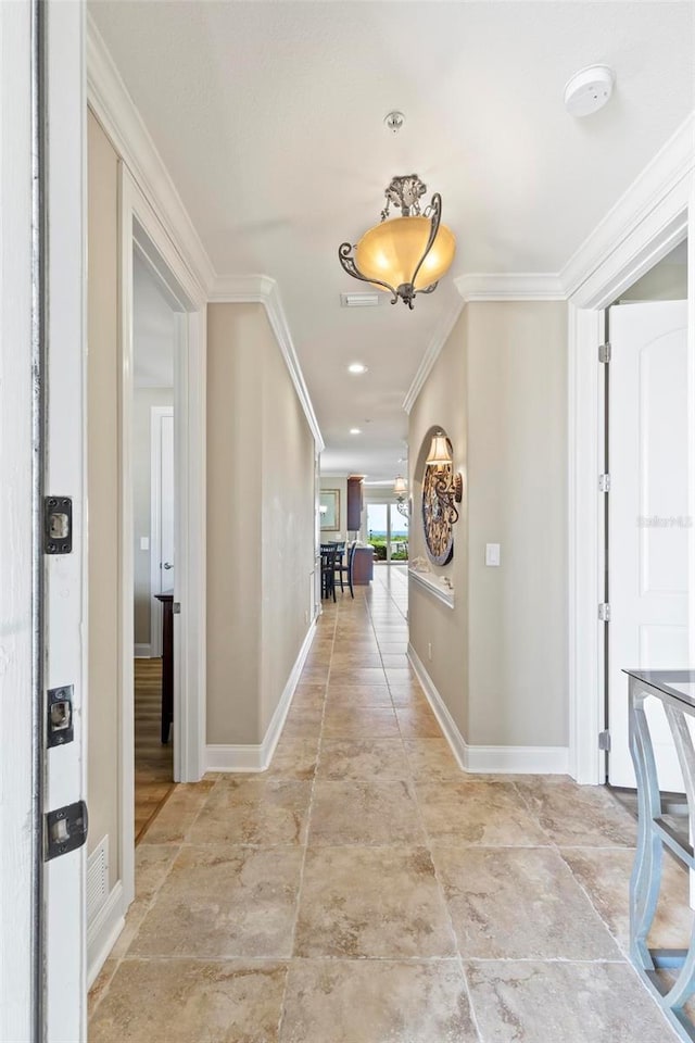 hallway with crown molding