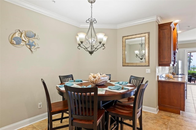 dining area featuring sink and crown molding