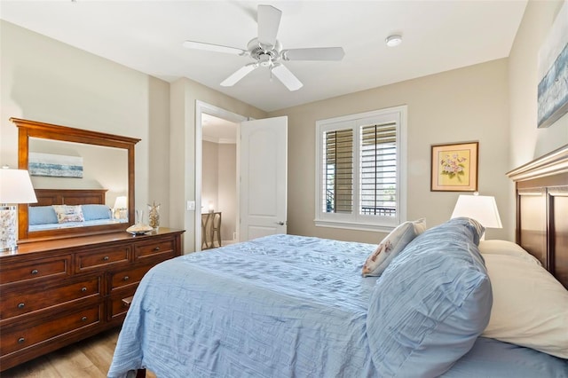 bedroom featuring ceiling fan and light hardwood / wood-style flooring