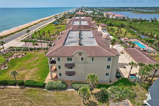 bird's eye view with a beach view and a water view