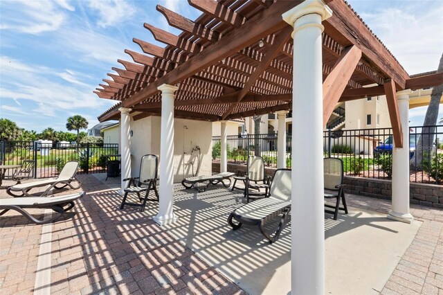 view of patio featuring a pergola