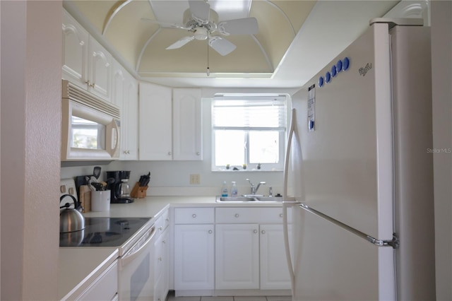 kitchen with ceiling fan, white cabinetry, white appliances, and sink