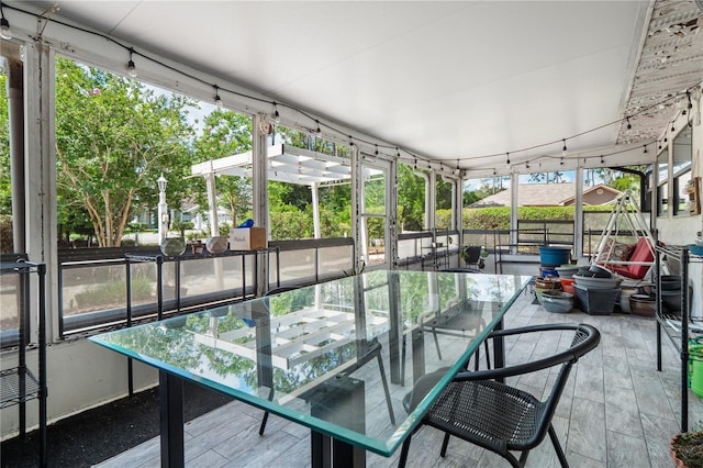 sunroom with plenty of natural light