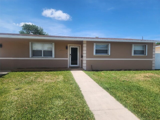 10611 SW 164th St, Miami, FL 33157 - single story home with stucco siding and a front yard