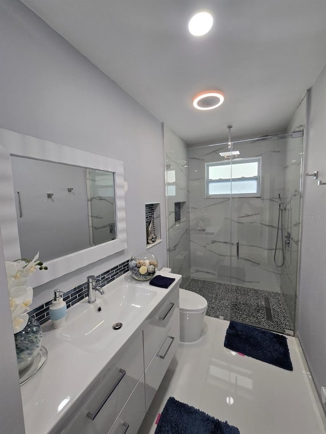 10611 SW 164th St, Miami, FL 33157 - full bathroom featuring a marble finish shower, toilet, and vanity