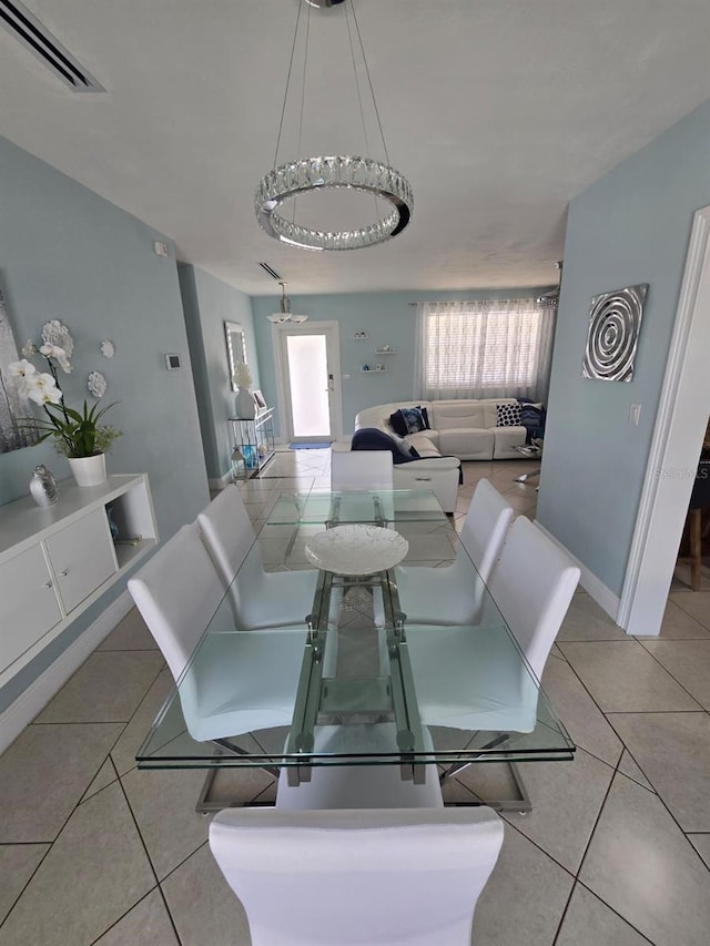 10611 SW 164th St, Miami, FL 33157 - dining room featuring light tile patterned flooring