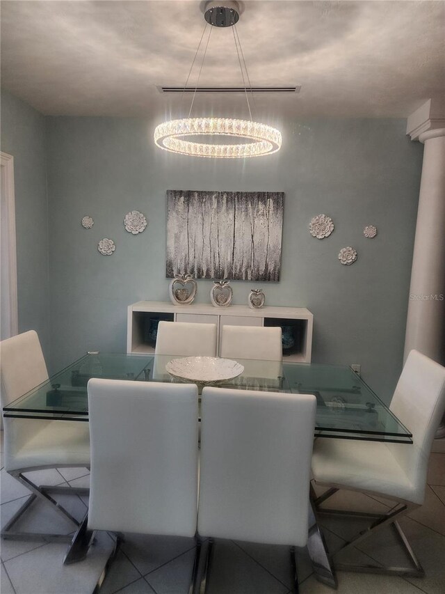 10611 SW 164th St, Miami, FL 33157 - dining area with tile patterned floors and a chandelier