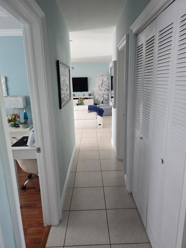 10611 SW 164th St, Miami, FL 33157 - corridor with an office area, light tile patterned floors, and baseboards