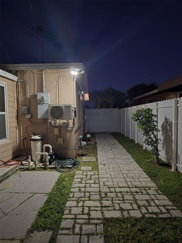 10611 SW 164th St, Miami, FL 33157 - patio at twilight with a fenced backyard and a patio area