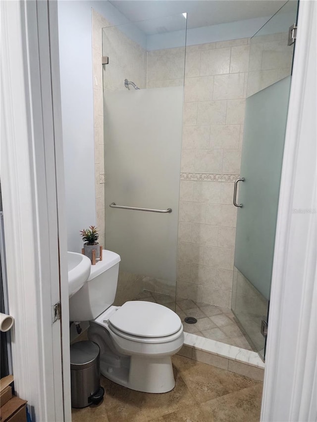 10611 SW 164th St, Miami, FL 33157 - full bathroom with a shower stall, toilet, and tile patterned floors