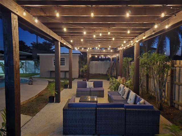 10611 SW 164th St, Miami, FL 33157 - patio at twilight with an outdoor living space, an outbuilding, a fenced backyard, and a patio area