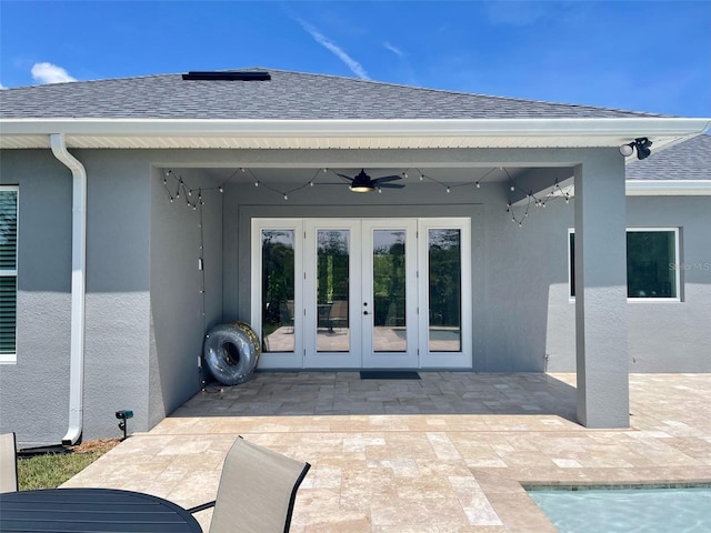 view of patio / terrace with ceiling fan and french doors