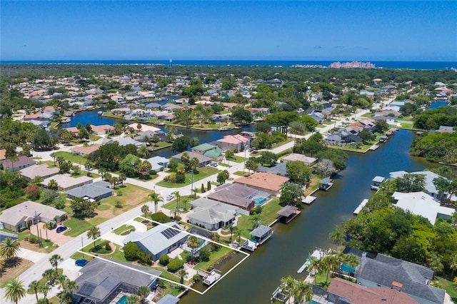 aerial view featuring a residential view and a water view