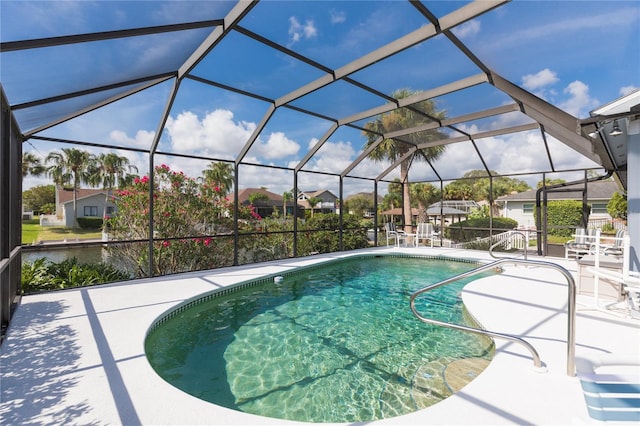 view of pool featuring a lanai and a patio area