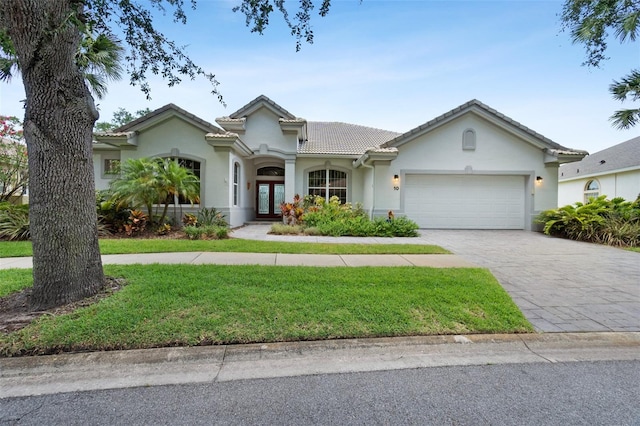 view of front of property with a garage