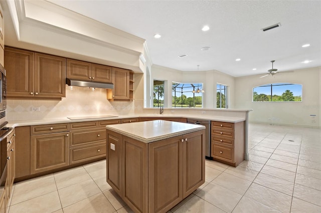 kitchen with black electric cooktop, stainless steel dishwasher, ornamental molding, a kitchen island, and backsplash