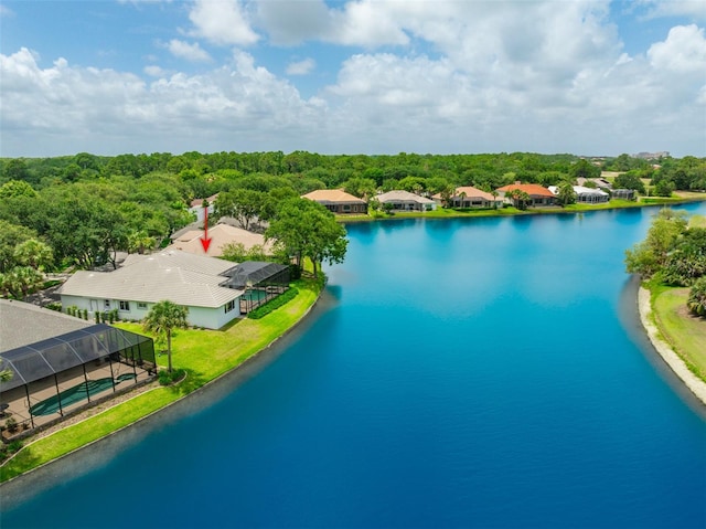 birds eye view of property featuring a water view