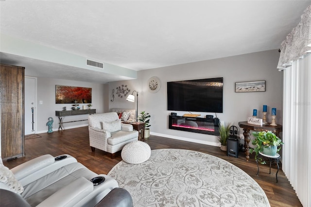 living room with dark wood-type flooring