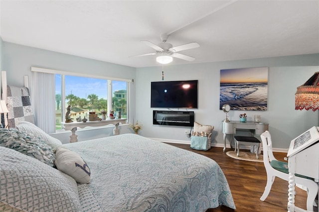 bedroom featuring ceiling fan and dark hardwood / wood-style flooring