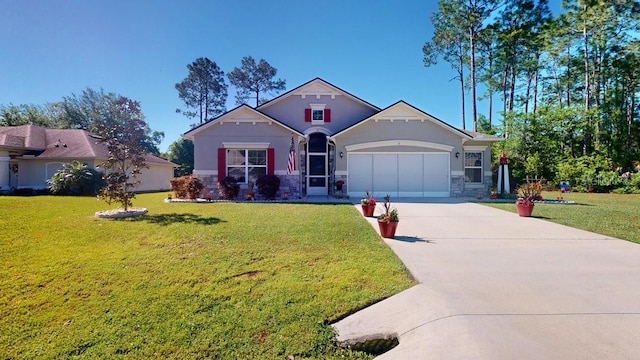 view of front of home featuring a garage and a front yard