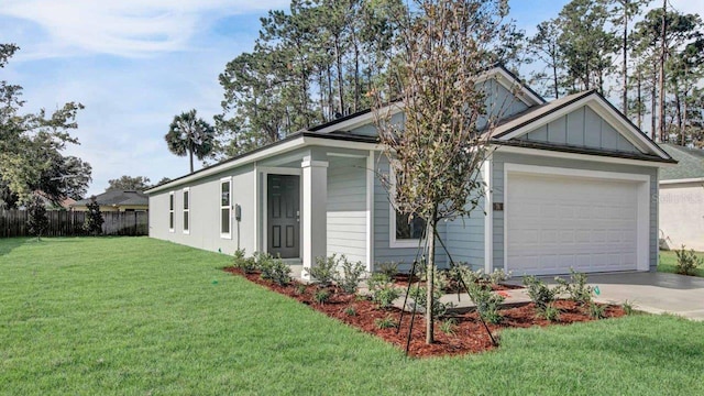 exterior space with a front lawn and a garage