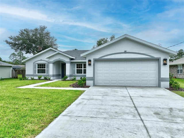 ranch-style home featuring a garage and a front yard