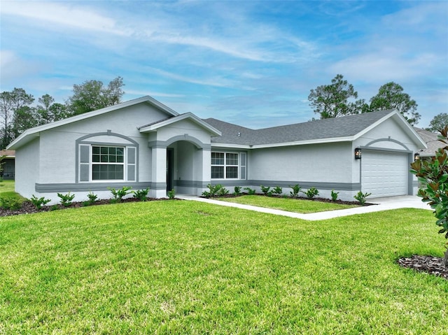 ranch-style home featuring a garage and a front yard