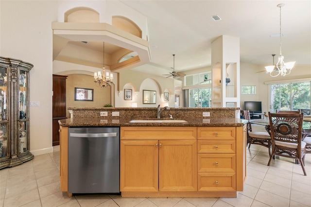 kitchen featuring decorative light fixtures, sink, dishwasher, and ceiling fan with notable chandelier