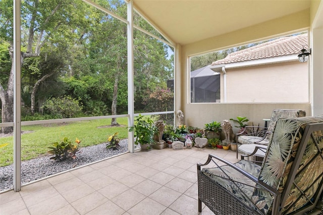 unfurnished sunroom with lofted ceiling