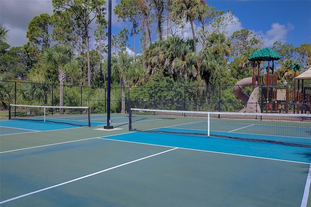 view of tennis court featuring basketball court