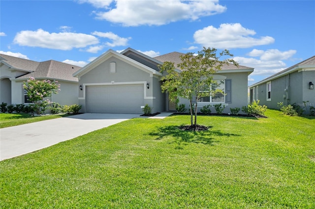 view of front of property featuring a front yard and a garage