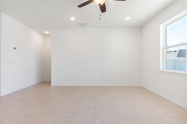 empty room featuring ceiling fan