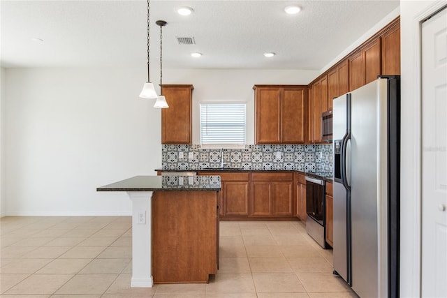 kitchen featuring a center island, stainless steel appliances, backsplash, decorative light fixtures, and light tile patterned floors