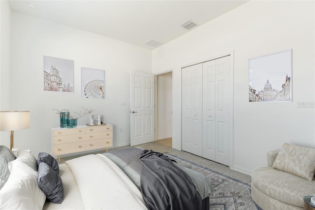 carpeted bedroom with a closet