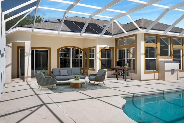 exterior space with a patio, a shingled roof, outdoor lounge area, an outdoor pool, and stucco siding