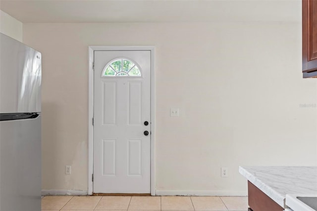 view of tiled foyer