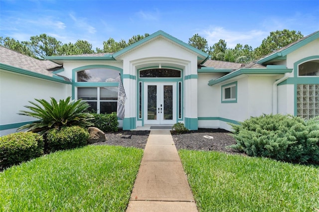 view of exterior entry with french doors