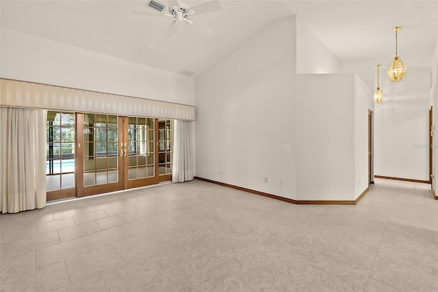 unfurnished living room featuring ceiling fan, high vaulted ceiling, and french doors