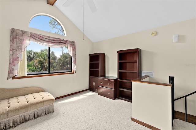 carpeted office space featuring beamed ceiling, high vaulted ceiling, and ceiling fan