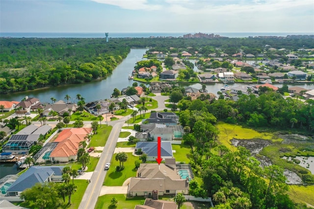 bird's eye view with a water view