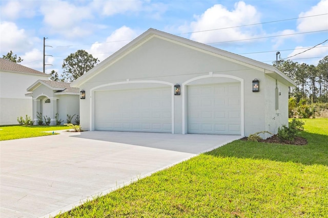 view of front facade featuring a front yard and a garage