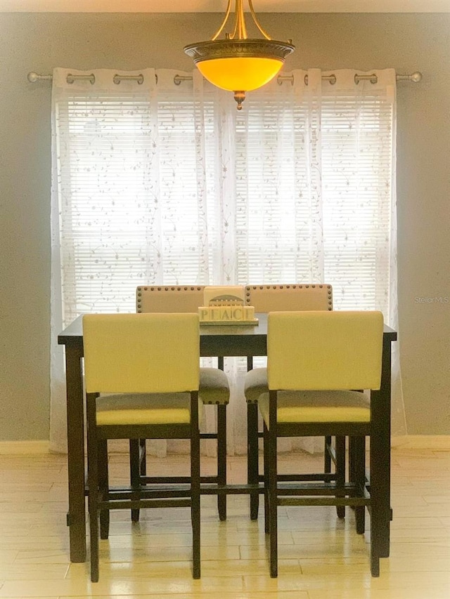 dining area with a wealth of natural light