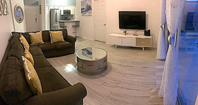 living room featuring light wood-type flooring