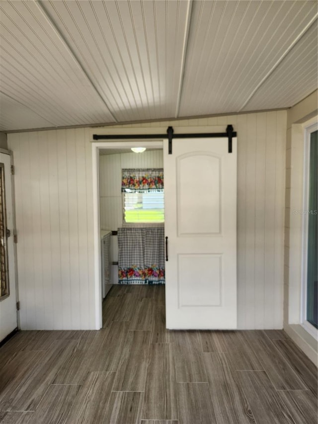 interior space featuring a barn door