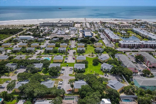 bird's eye view with a beach view and a water view