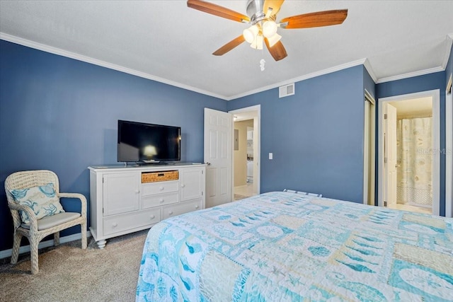 carpeted bedroom with connected bathroom, ceiling fan, and crown molding