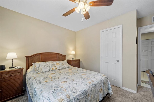 bedroom with ceiling fan and carpet