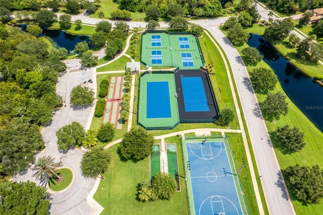 birds eye view of property featuring a water view