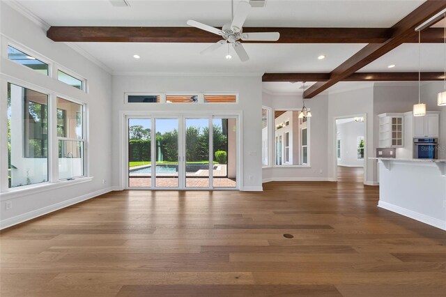 12245 Park Ave, Windermere, FL 34786 - unfurnished living room featuring beam ceiling, ceiling fan, wood finished floors, baseboards, and recessed lighting
